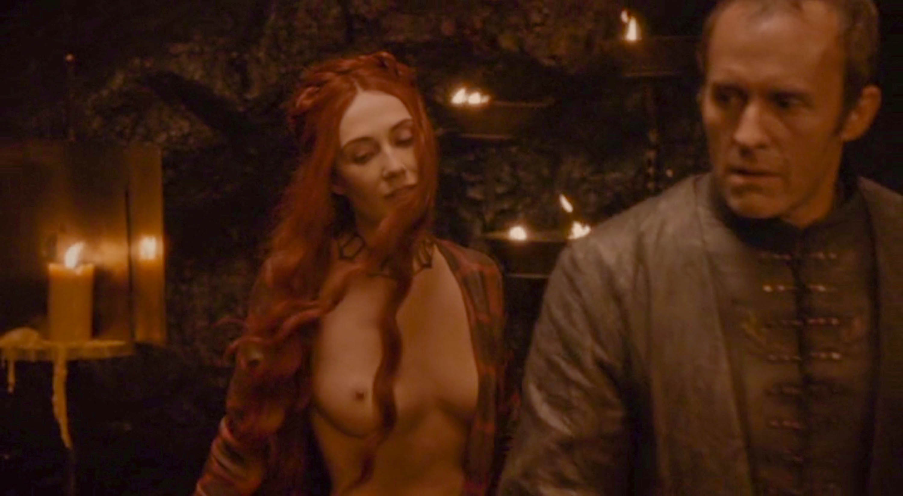 Priestess Melisandre (Carice Van Houten) seduces Stannis Baratheon (Stephen...